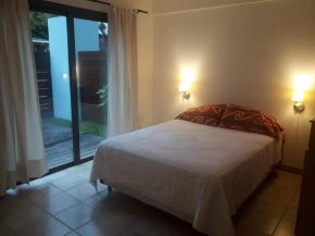 Depto Centrico con pequeño jardin y parrilla